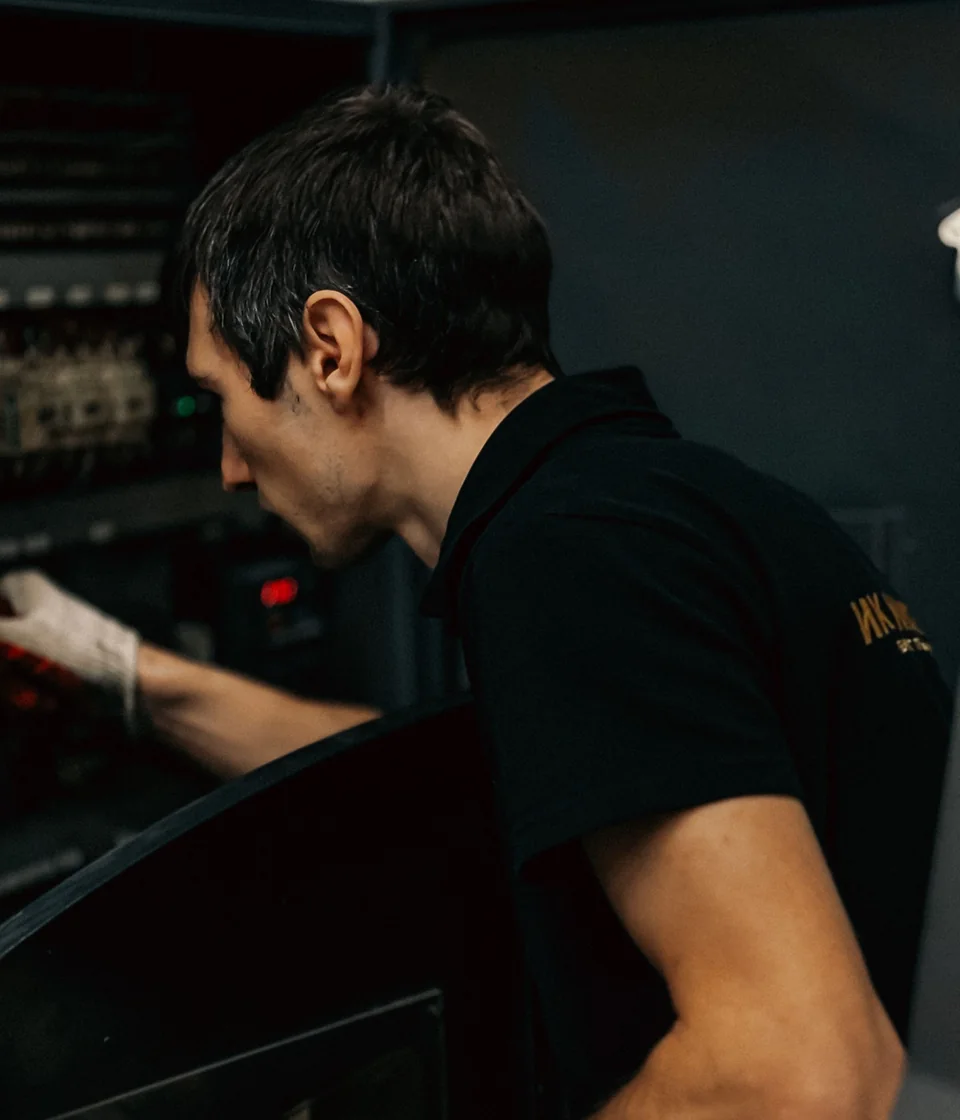 Illustrative technician inspecting industrial equipment before quotation